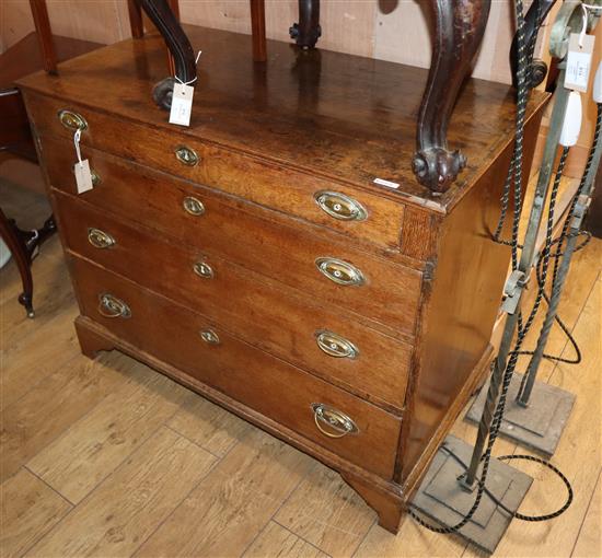 A George III oak four drawer chest W.100cm